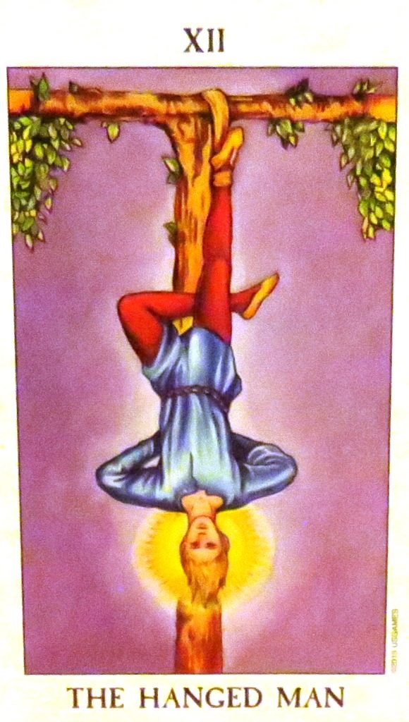 The Hanged Man tells you that sometimes, before you can take the next step, you have to put everything on hold, or the World will do it for you.  